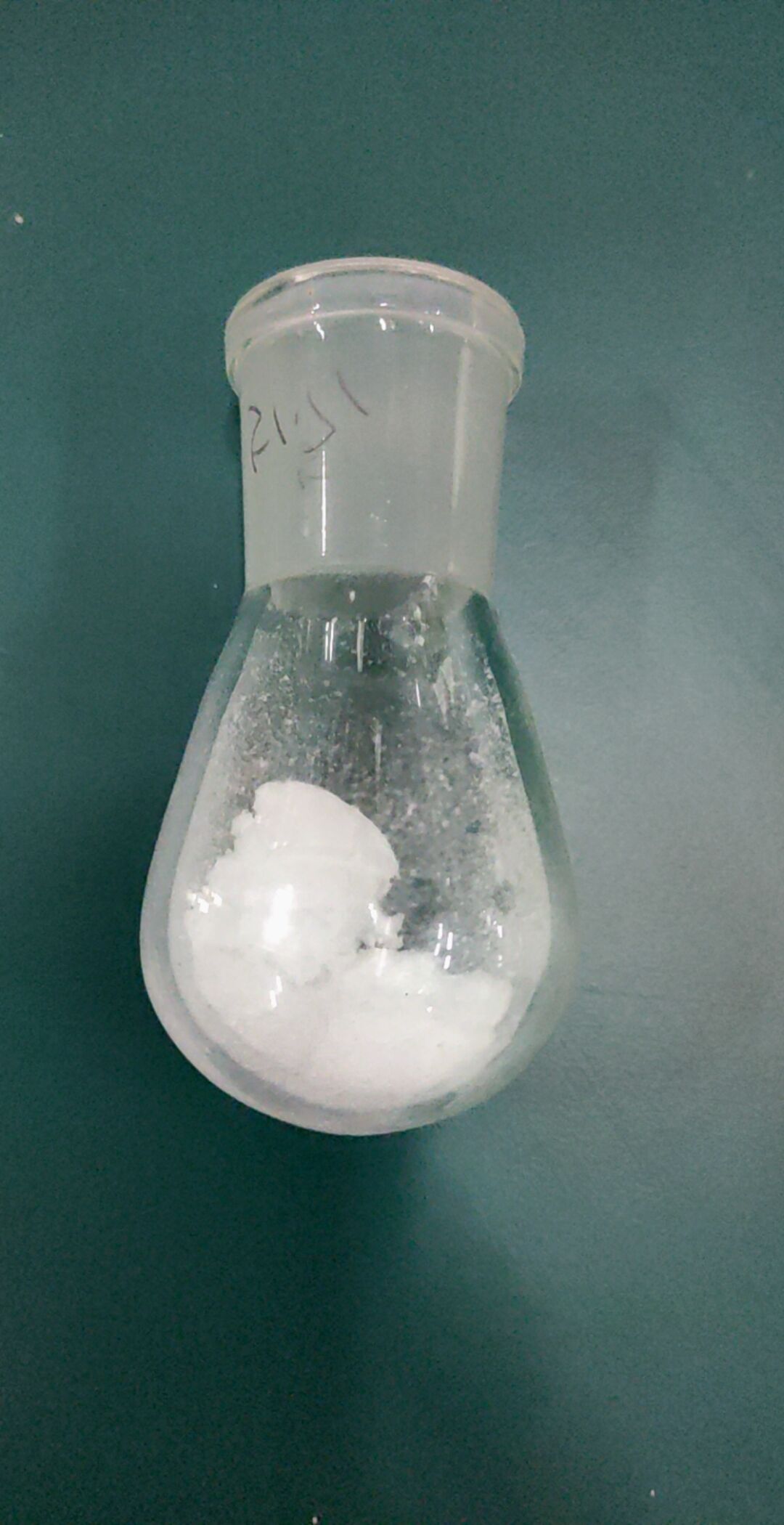 3-Pyridinecarboxylic acid, 2-(4-phenyl-1-piperazinyl)-